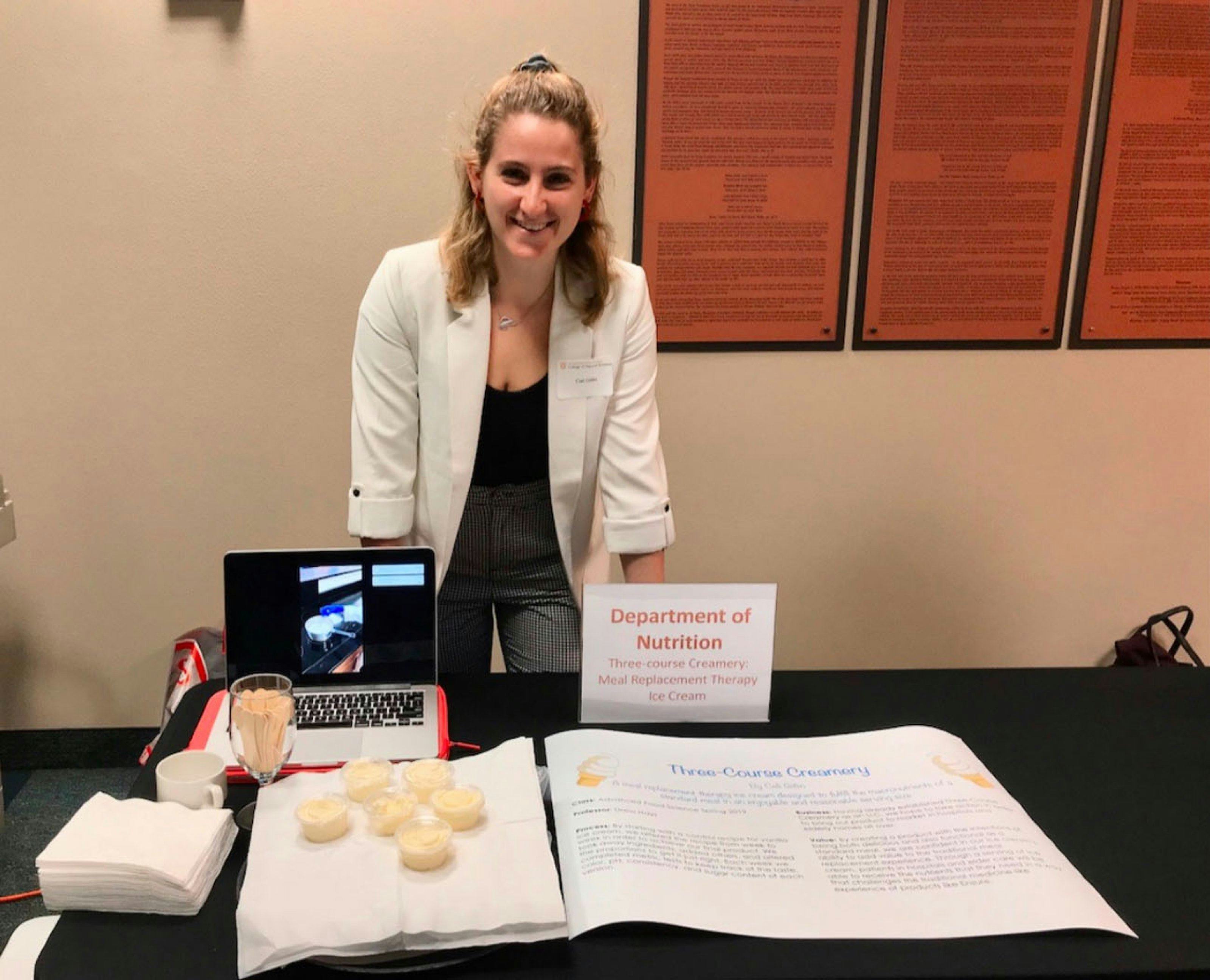 Three Course Creamery founder presenting her product